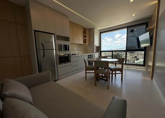 Apartamento Alto Padrão em Bombinhas à 70 metros da praia, com piscina aquecida, sala de jogos, academia e espaço kids!!